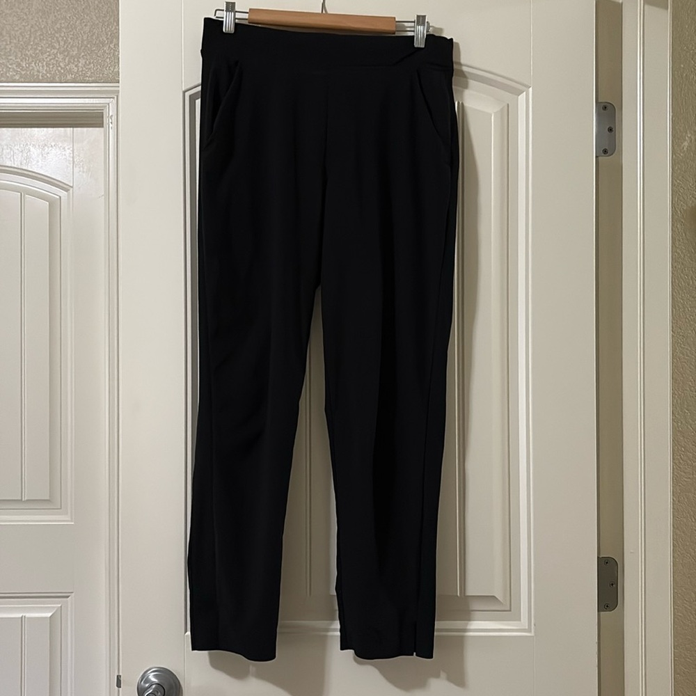 Athleta black sizeโ 6 joggers. With tuxedo striped down the sides.